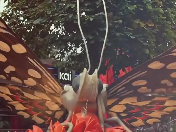 A giant butterfly on a flower