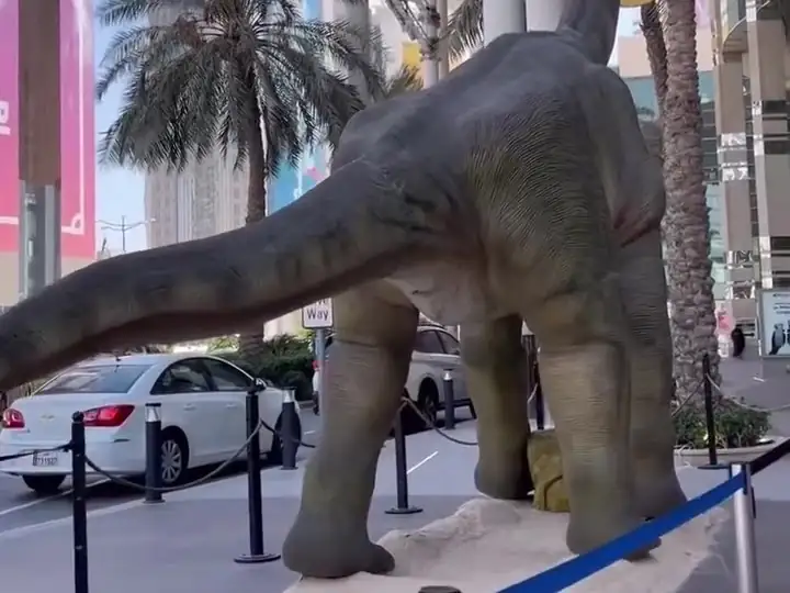A life-size Brachiosaurus outside City Center Doha