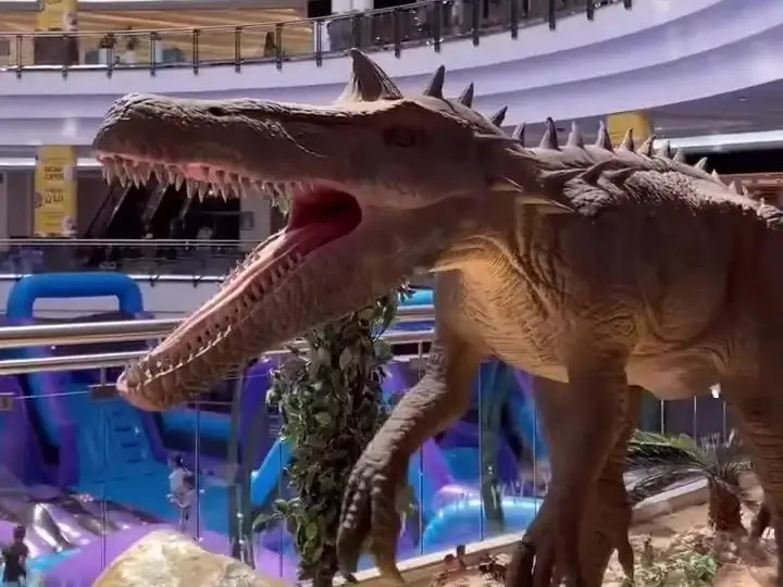 An animatronic T-Rex in the main atrium at City Center Doha