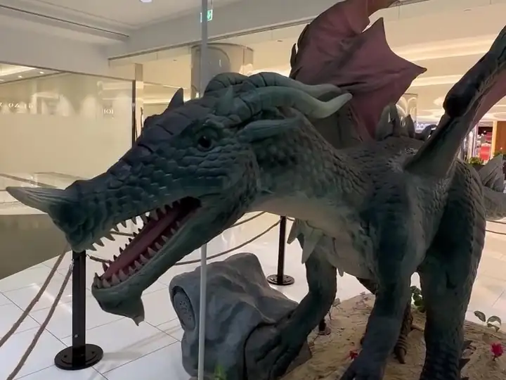 An animatronic dragon at City Center Doha