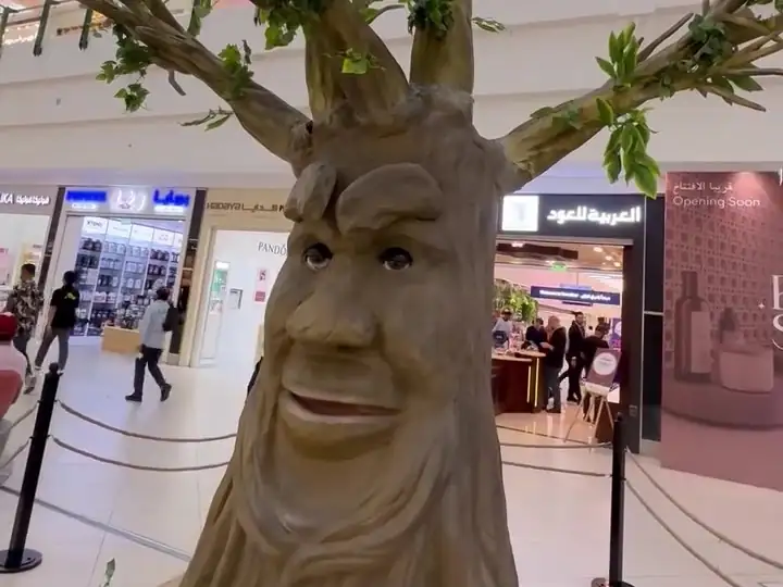 An enchanted talking tree welcoming visitors